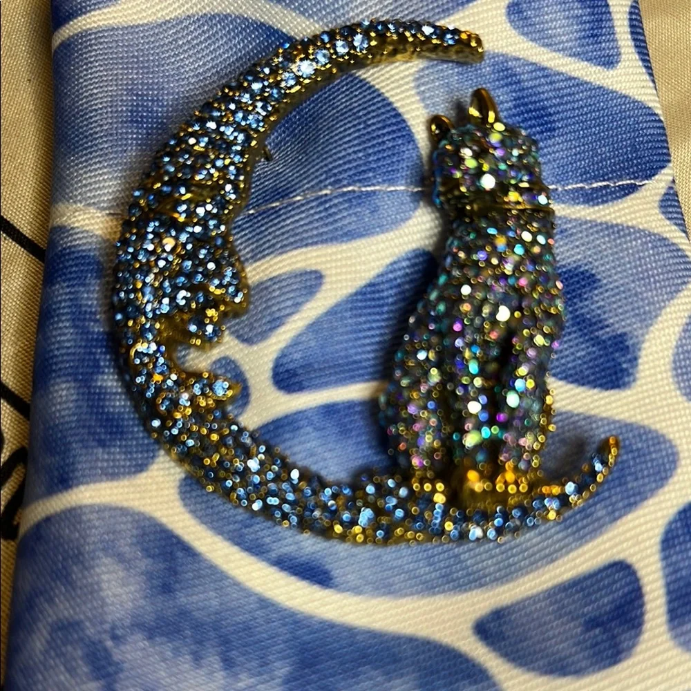 BETSEY Johnson’s Sparkling Blue and Gold Cat Brooch